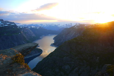 Scenic view of mountains against sky during sunset