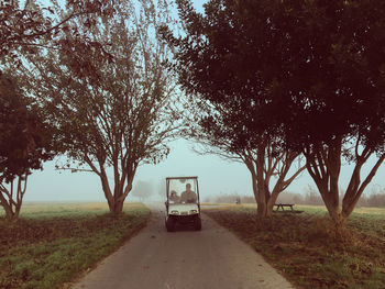 Road passing through field