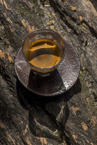 High angle view of tea cup on wood