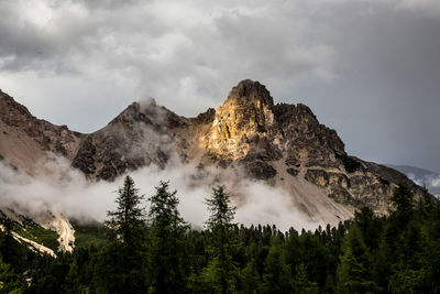 Low angle view of mountain range against sky