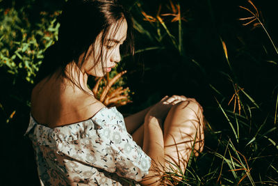 Low section of woman on tree