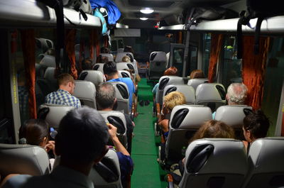 High angle view of people sitting in bus