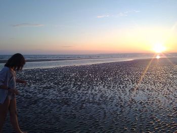 Scenic view of sea at sunset