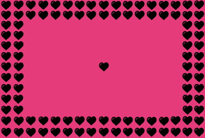 Close-up of heart shape with pink balloons against colored background