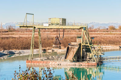 View of gravel pit against clear sky
