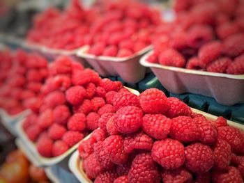 Close-up of raspberries for sale at market stall