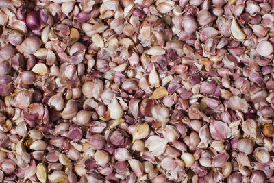 Full frame shot of garlic for sale at market stall