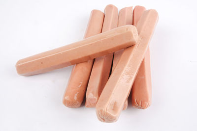 High angle view of bread on white background