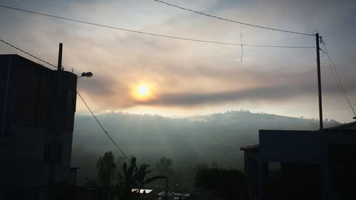 Scenic view of cloudy sky at sunset