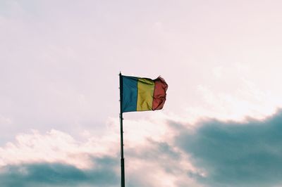 Low angle view of flag against sky