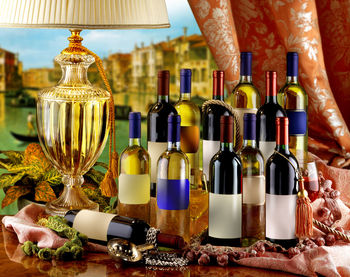 Close-up of wine bottles on table