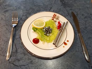High angle view of food served in plate on table