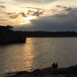 Scenic view of sea at sunset