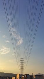 Power lines against sky