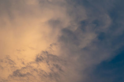 Low angle view of dramatic sky during sunset