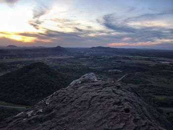 Scenic view of landscape against sky during sunset