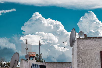 Panoramic view of sea and buildings against sky