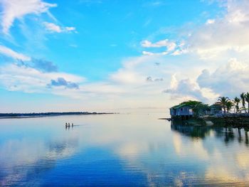 Scenic view of sea against cloudy sky