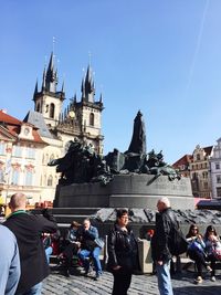 People by jan hus memorial at old town square