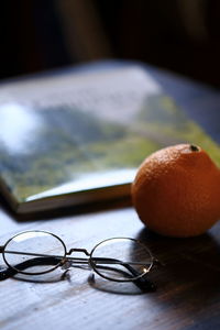 Close-up of oranges on table