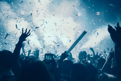 Crowd at music concert at night