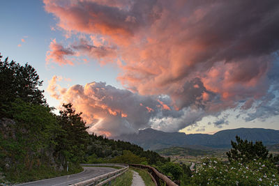 Scenic view of mountains against sky during sunset