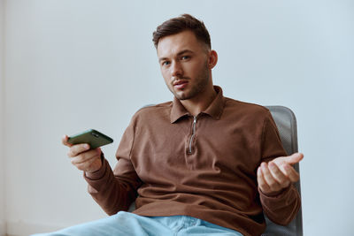 Young woman using mobile phone