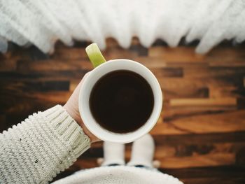 Close-up of coffee cup on table
