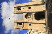 Facade of historic building against sky