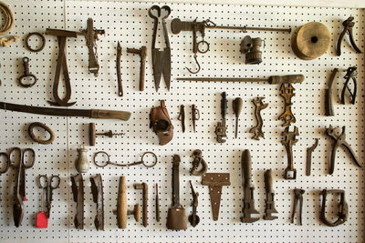 Directly above shot of tools on wall