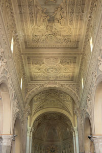 Low angle view of illuminated ceiling