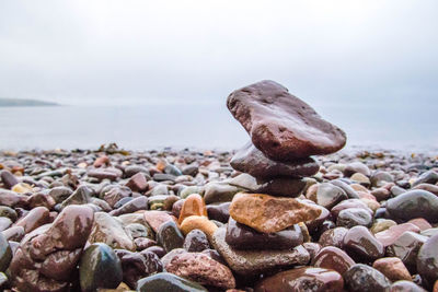 Close-up of stones on beach