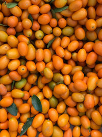 Full frame shot of oranges at market stall