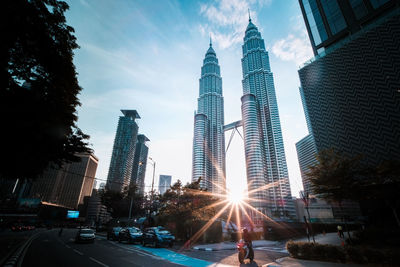 Modern buildings in city against sky