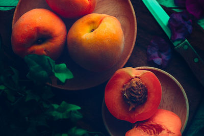 Peaches in dark food. concept of gastronomy