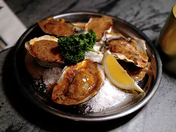 High angle shot of oysters on plate