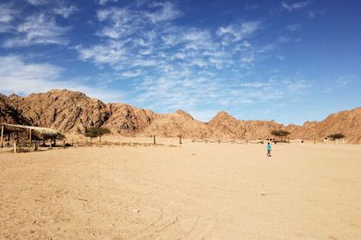 Scenic view of desert against sky