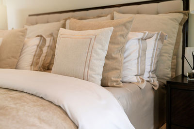 Close-up of sofa on bed at home