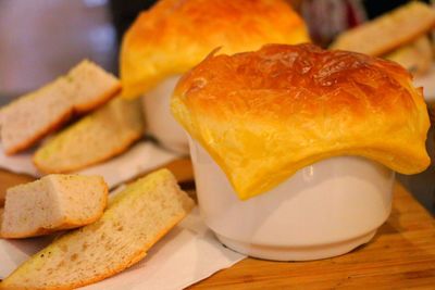 View of cup and pieces of bread