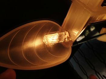 Close-up of illuminated light bulb