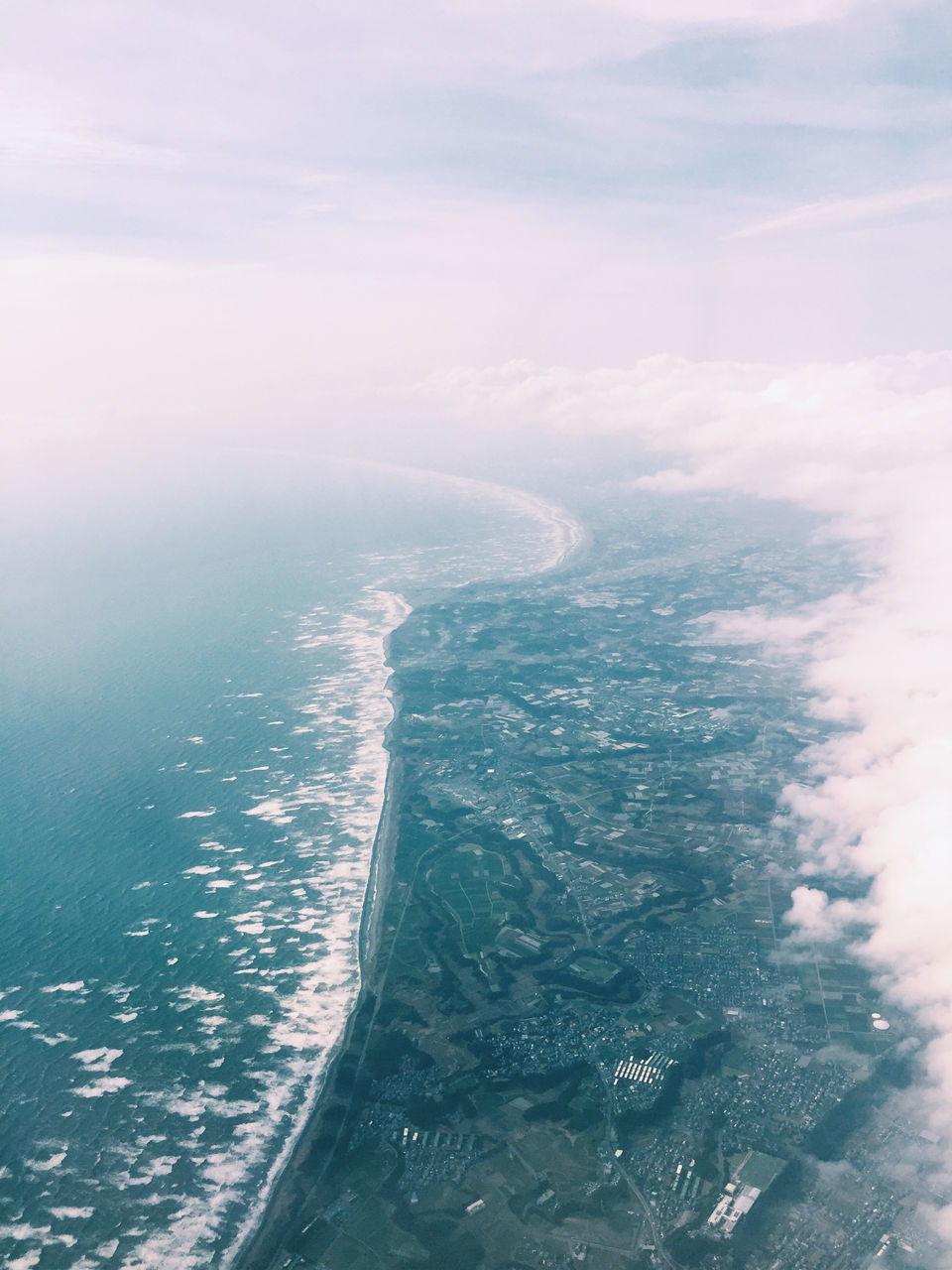 sea, water, scenics, horizon over water, sky, beauty in nature, tranquil scene, tranquility, aerial view, nature, waterfront, high angle view, cloud - sky, idyllic, day, seascape, coastline, outdoors, blue, cloud