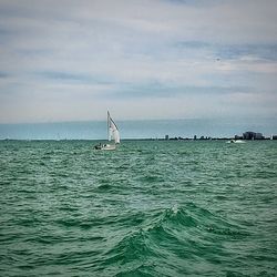 Boat sailing in sea