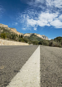 Surface level of road against sky