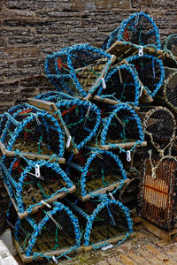 Close-up of fishing net in basket