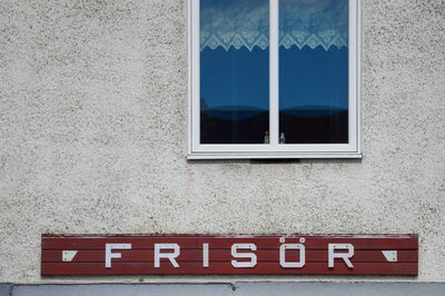 Close-up of window on wall of building