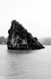 Scenic view of sea with mountains in background