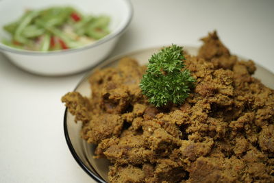 Close-up of salad in plate on table