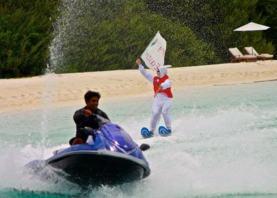 Close-up of woman standing in pond