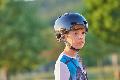 Close-up of boy wearing helmet