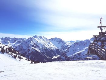 Snow covered mountains against sky